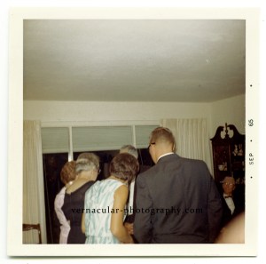 1960s snapshot of backs of people's heads